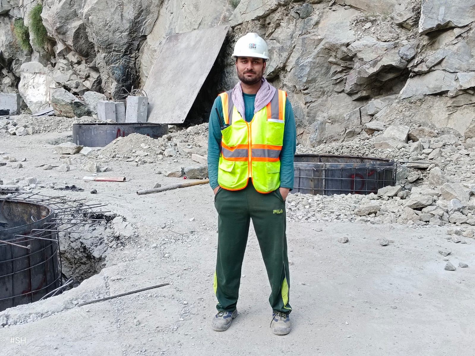 Suleman Hakeem at a rock excavation area on site